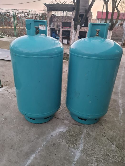 Vand  2 buteli  150 litri județul  olt