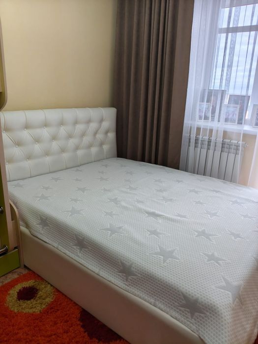 Двуспальняя кровать