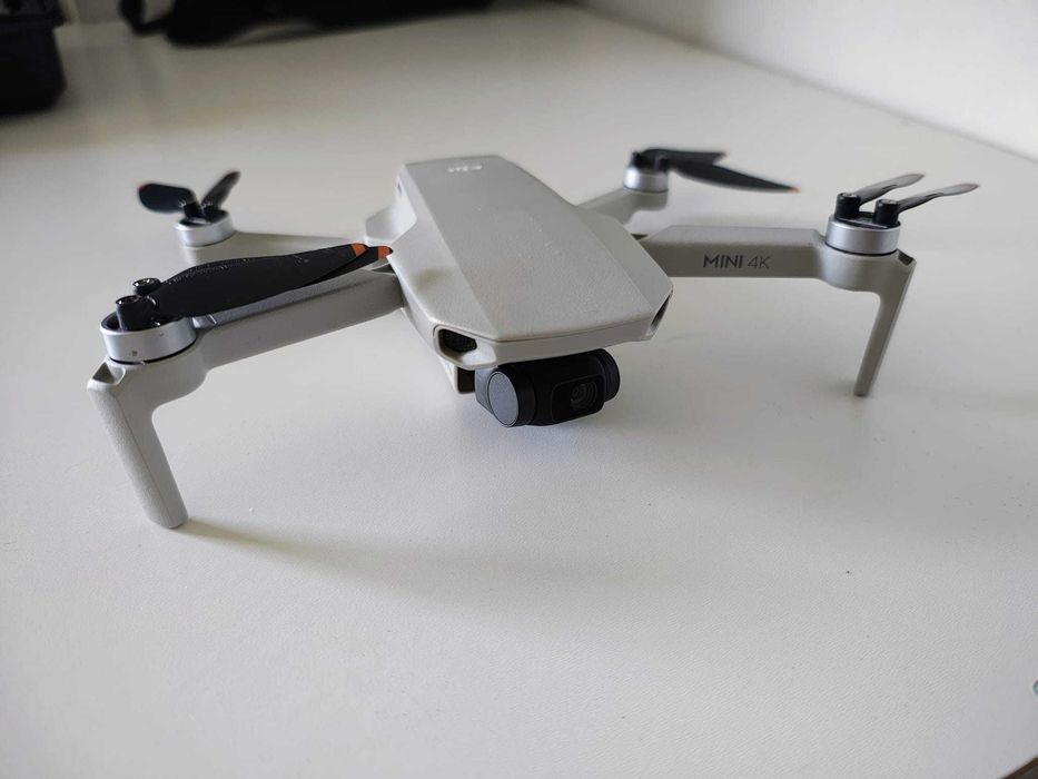Drona DJI Mini 4K aproape noua (mai are un an garantie)