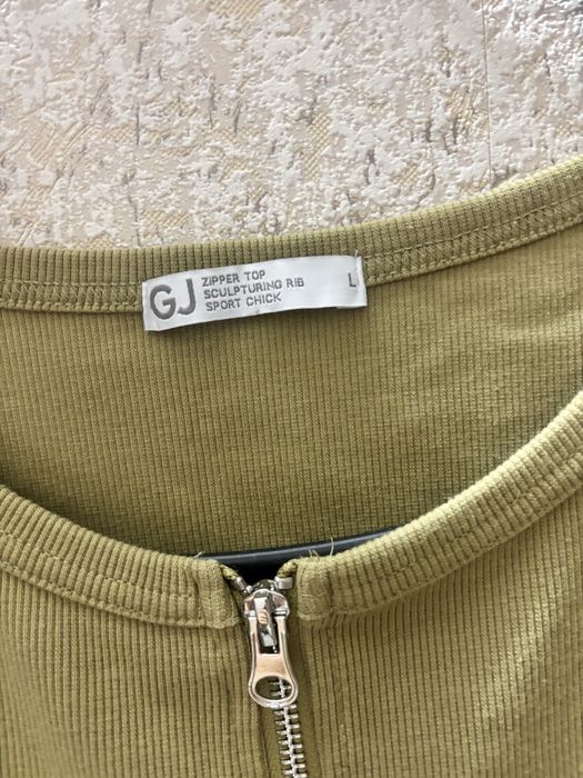 Одежда по 200 тенге