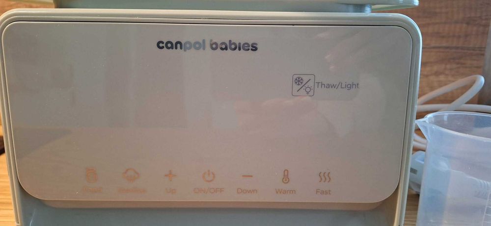 Нагревател и стерилиатор 7в1 с термостат и лампа - Canpol