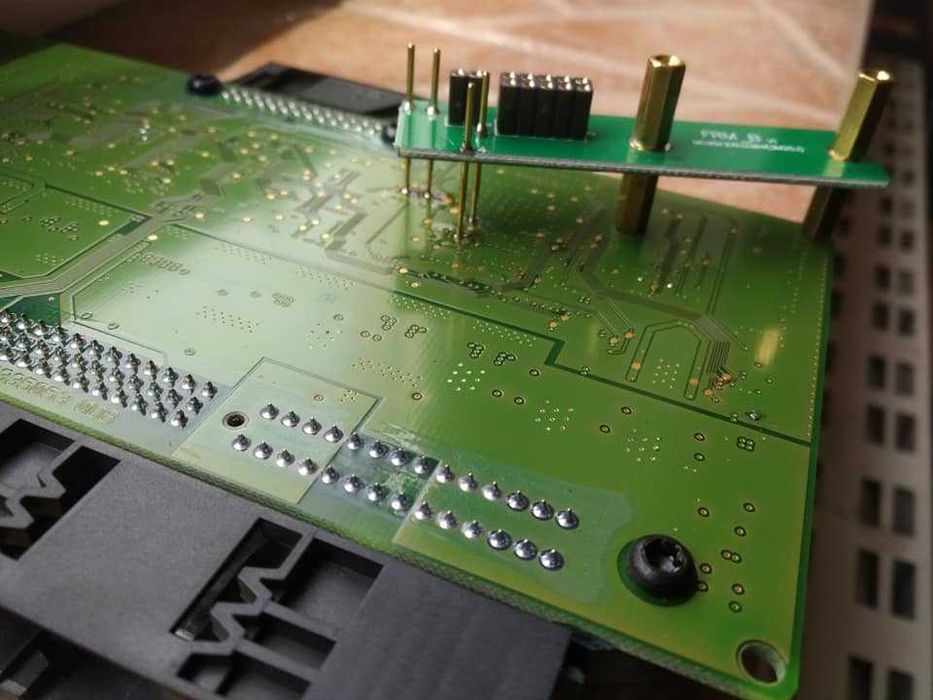 Reparatii Resoftari FRM Bmw Modul lumini X1 X5 X6 E90 E91 E84 E87 E70