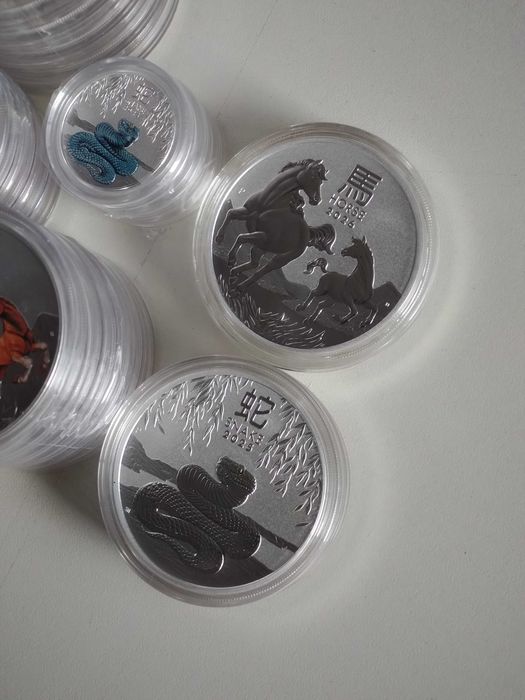 Сребърни монети от "Lunar series", 1 oz, 1/2 oz,Австралия
