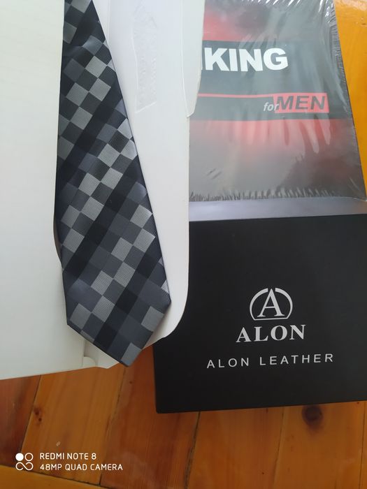 Remen. Erkaklar uchun. Yangi.