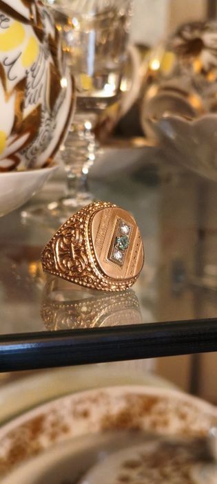 Перстень золотой.