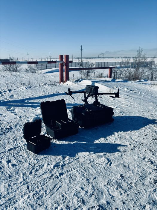 Аэрофотосъёмка , геодезист с дроном.