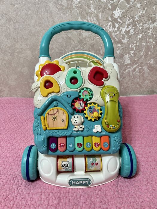 Музыкальная каталка-ходули с развивающей панелью