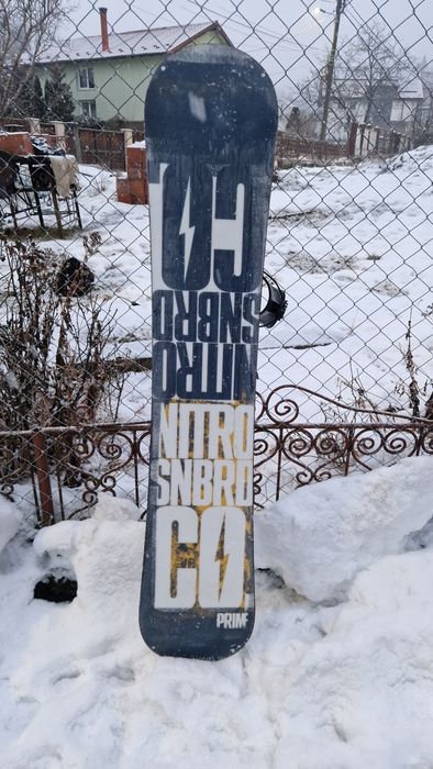 Placă snowboard Nitro + legături Flow (prindere rapidă)