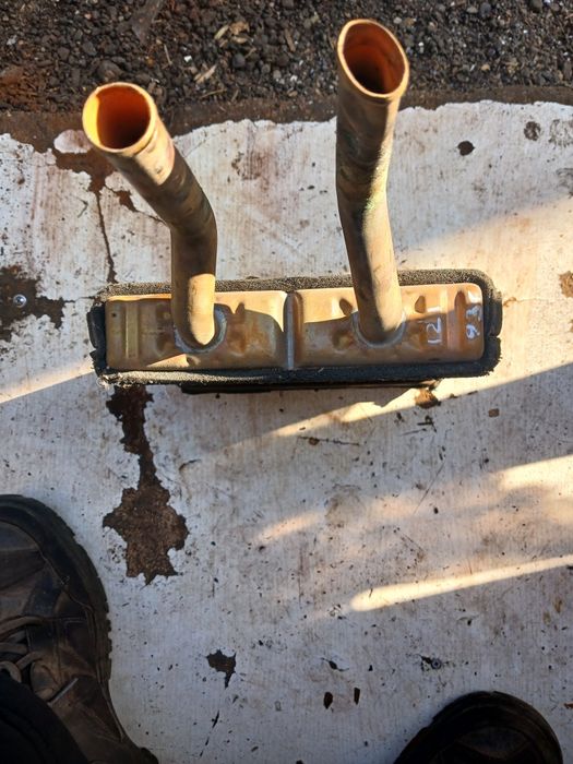 Радиатор печки Мазда 121