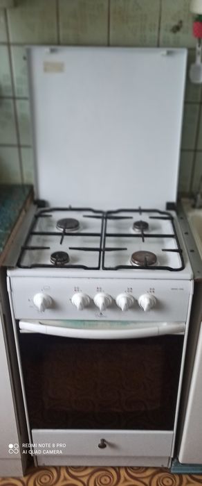 Газовая плита с баллоном пропана