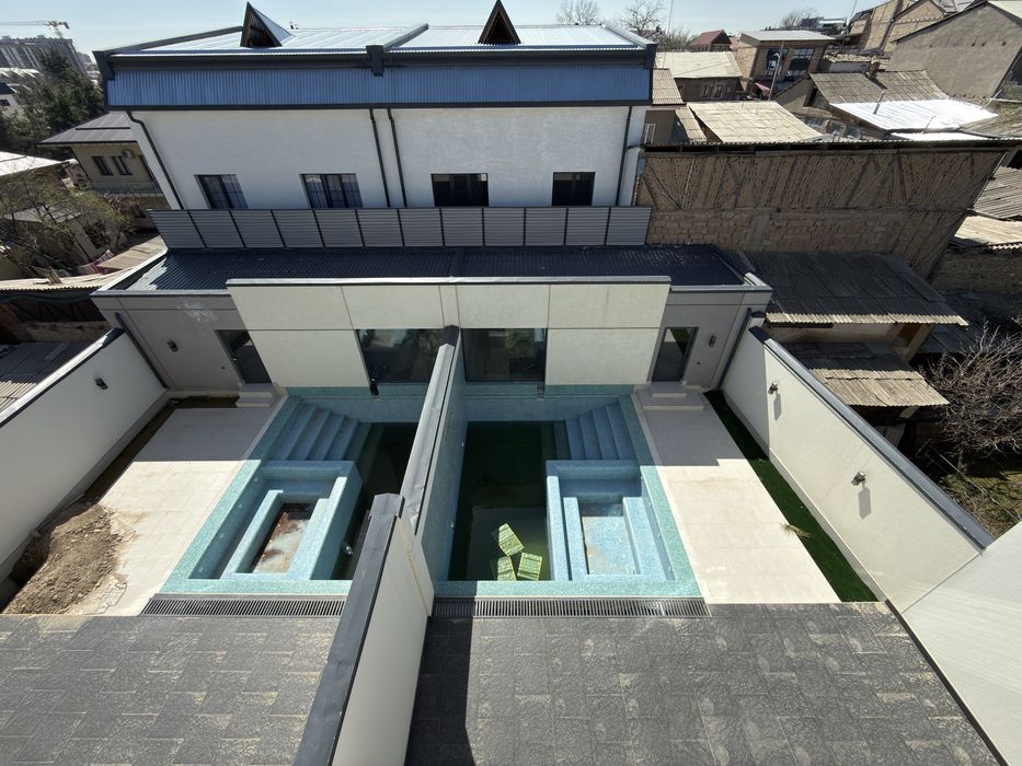 Продажа коттеджей на Циолковской 3,2 сотки 4 этажа бассейн летний двор