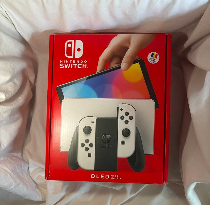 Vand Nintendo Switch Oled stare noua cu 2 jocuri