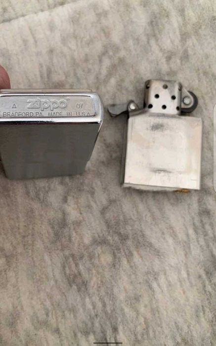 Zippo зажигалка .