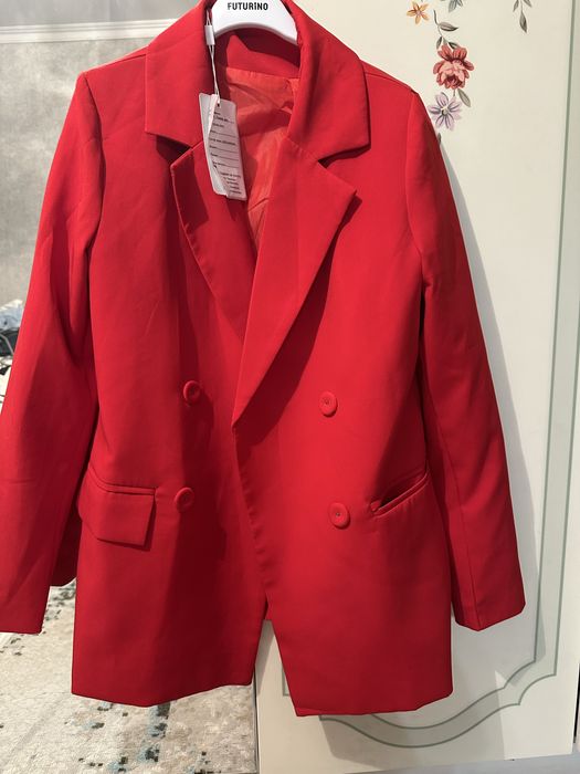 Продаю новый костюм