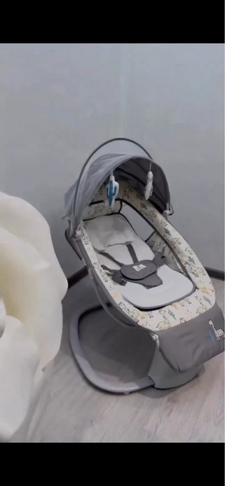 Шезлонг качеля. С рождения до 3х лет.