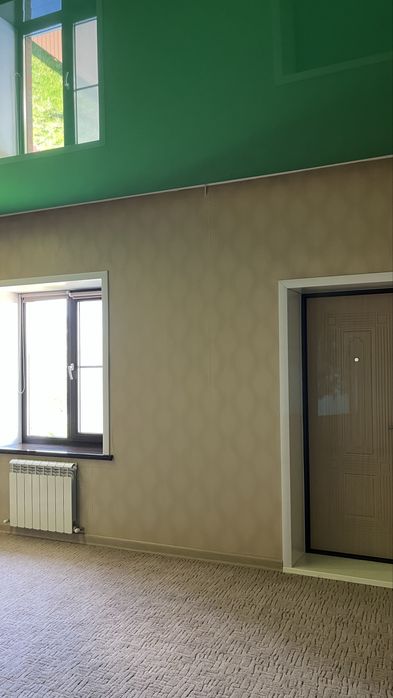 Трех уровневый дом в центре города.