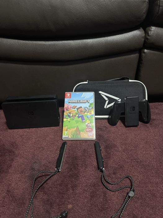Nintendo switch oled cu geanta si jocul minecraft