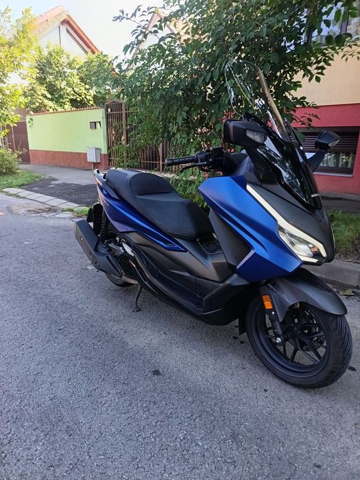 Honda Forza 125,15 cp,