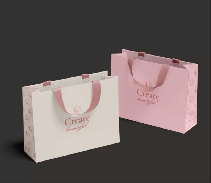 Гул учун подарочный пакетлар.  Бренд номи езилган  бумажный пакетлар