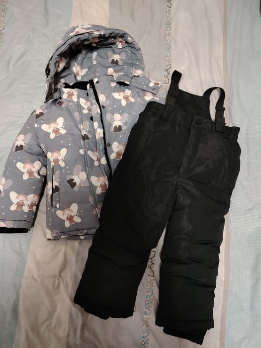 Продам детский зимний комбинезон на девочку