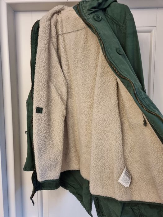 Geaca groasă cu vestă detașabilă.