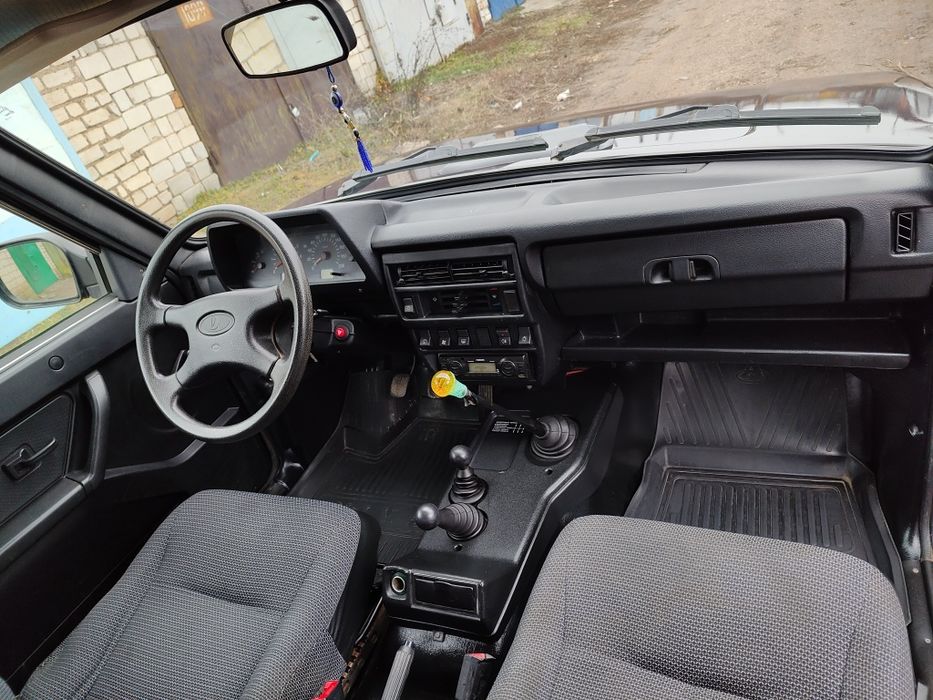 Нива Рысь 212140