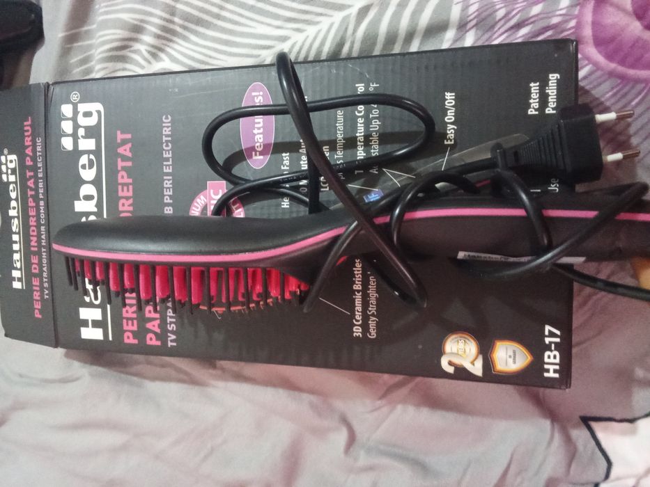 Perie de uscarea și îndreptarea parului