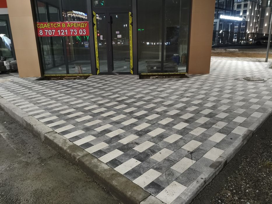 Укладка брусчатки, тротуарной плитки.