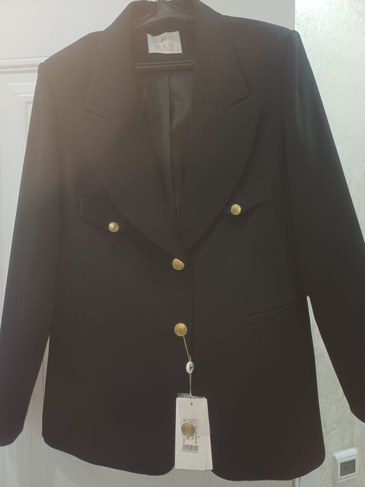 Продам новый пиджак женский двубортный