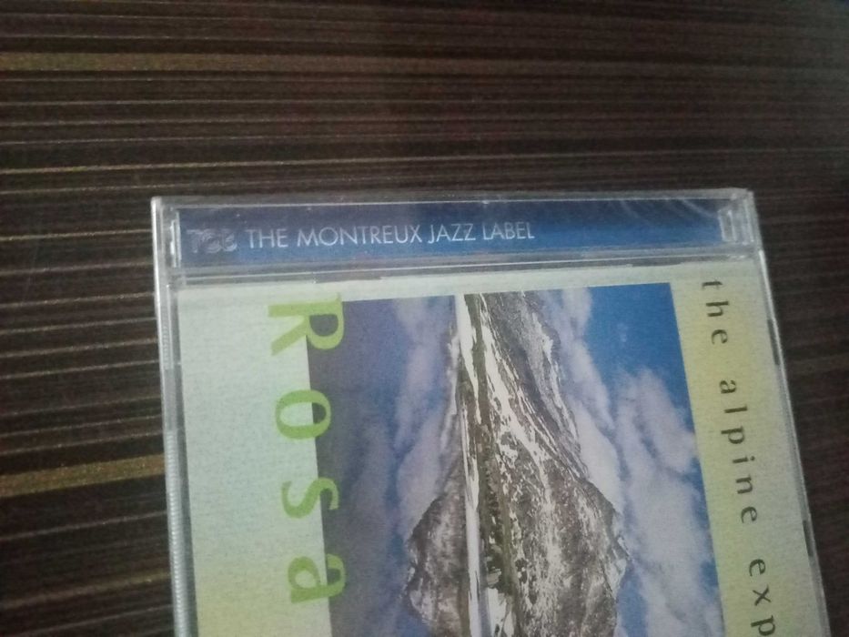 Новый запокованный. Альбом- диск с 12 песнями Rosa Loui - Hans kennel