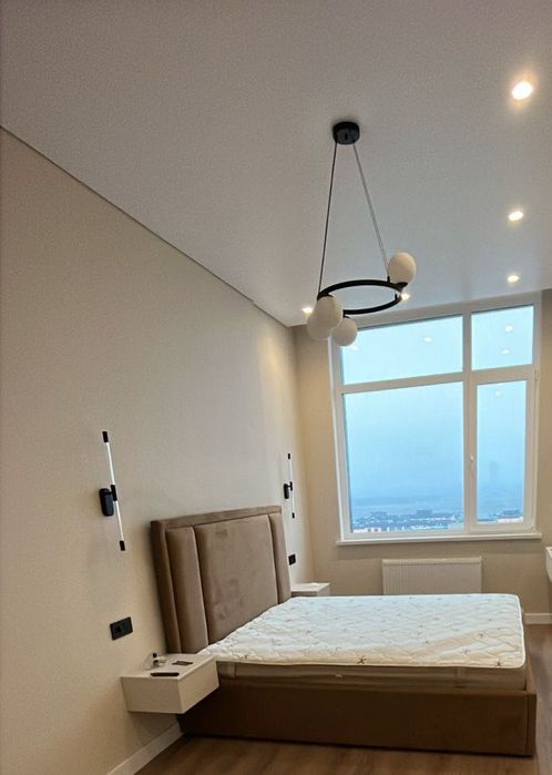 Кровать с подъемным механизмом