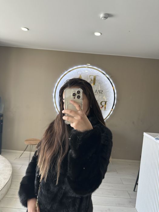 Шуба черного цвета за 100 тыс