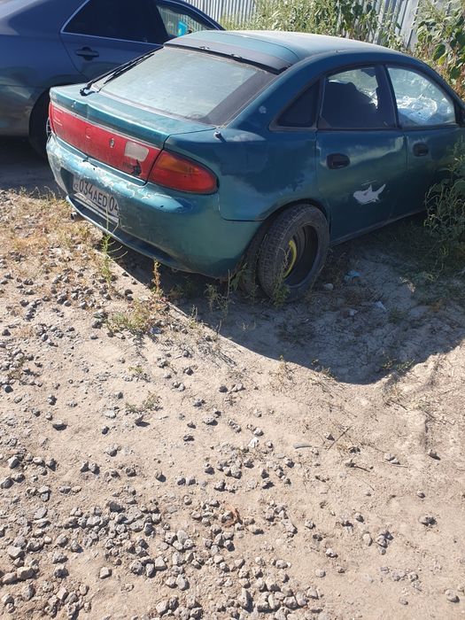 Продам  мазда 323