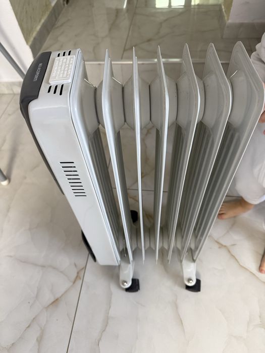 Titlu: Calorifer electric cu ulei Victronic OFR-7, 1500W, 7 elemenți