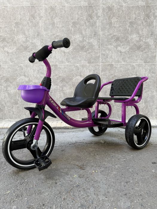 Детский транспорт. Велосипед с дополнительным сиденьем.