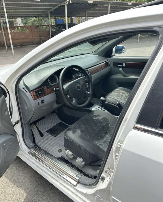 Lacetti 1.8 Avtomat, Full (suyegi butun, kraska, chaqa-chuqasi bor)