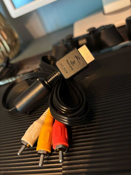 Playstation 3 - SuperSlim - 500 GB + Jocuri