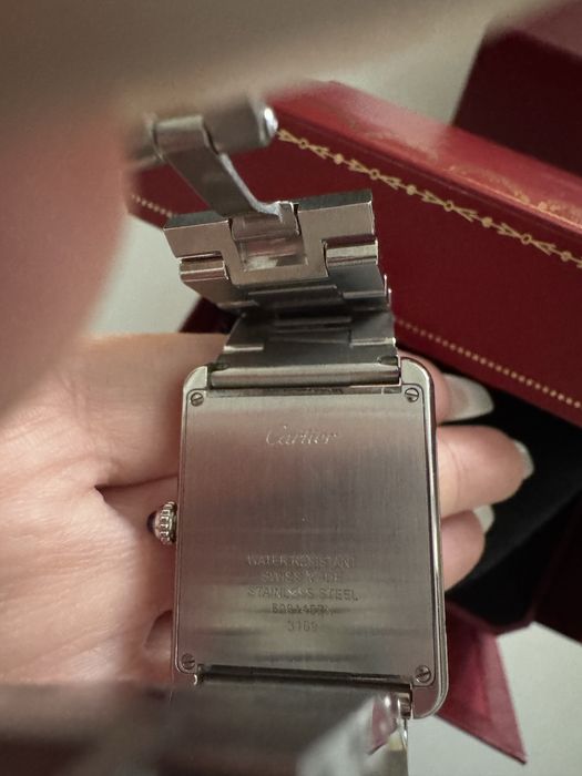 Cartier часы tank must