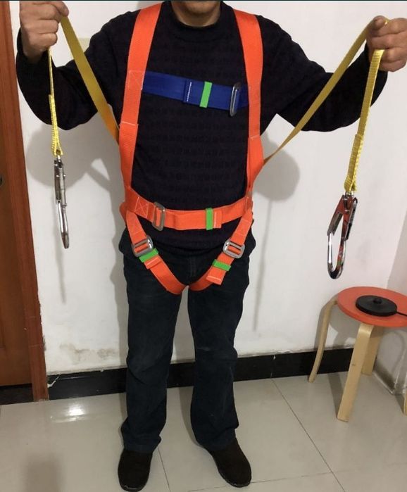 Страховочный пояс для строительства.