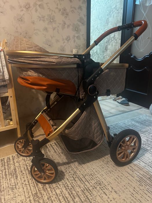 Детская коляска с автокреслом