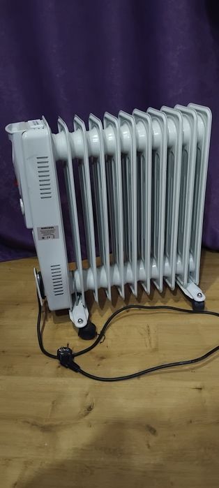 Обогреватель масляный радиатор