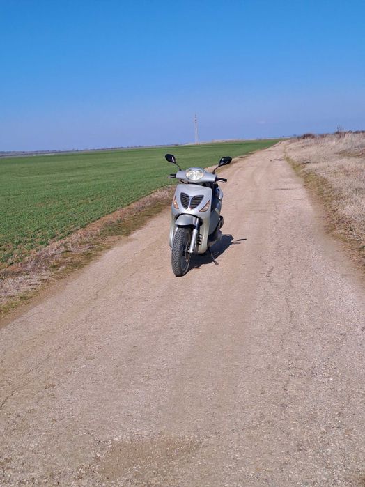 Скутер хонда 125 кубика