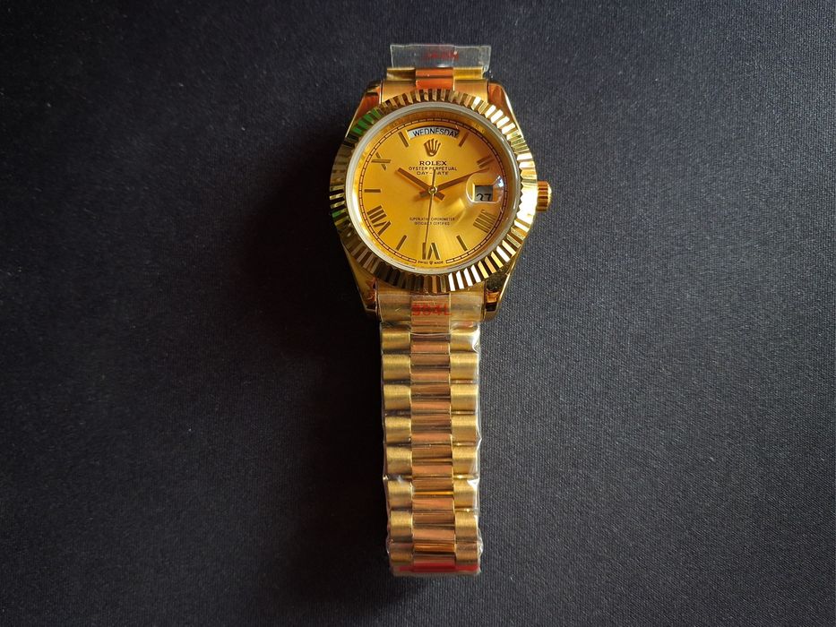 Rolex  Submariner, Day-Date Gold