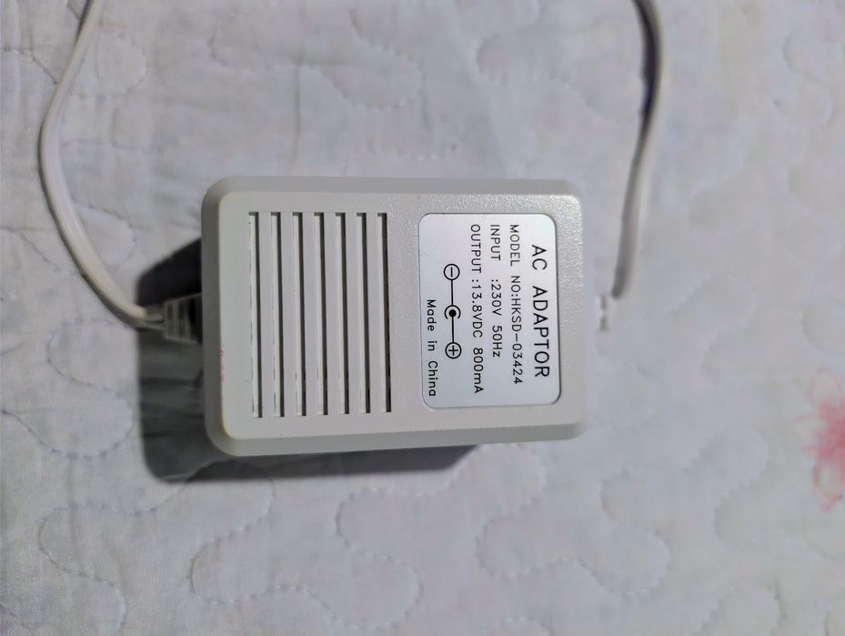 Alimentator AC Adaptor 13.8V DC 800mA Model HKSD-03424