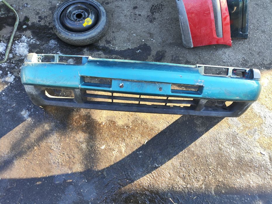 Бампер на мазду 323ф