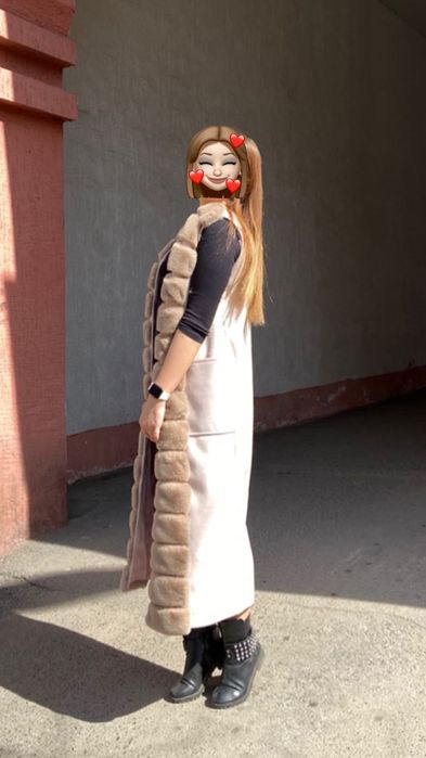 Тёплая жилетка женская