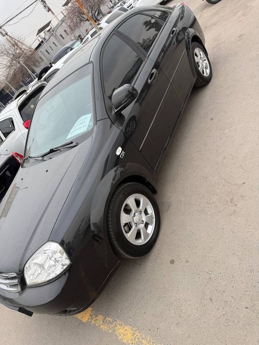 Шевролет Ласетти 1.6