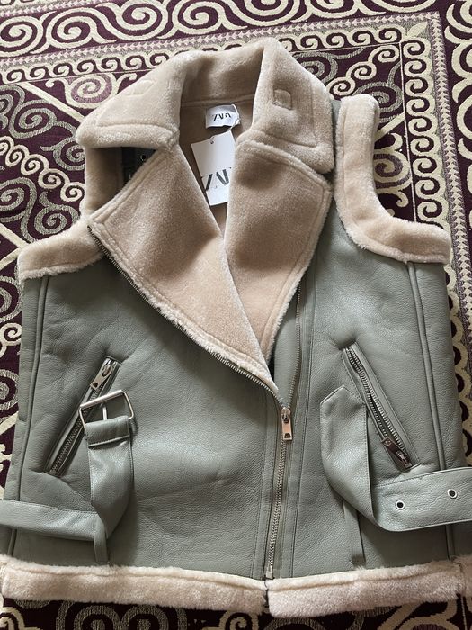 Безрукавка новый