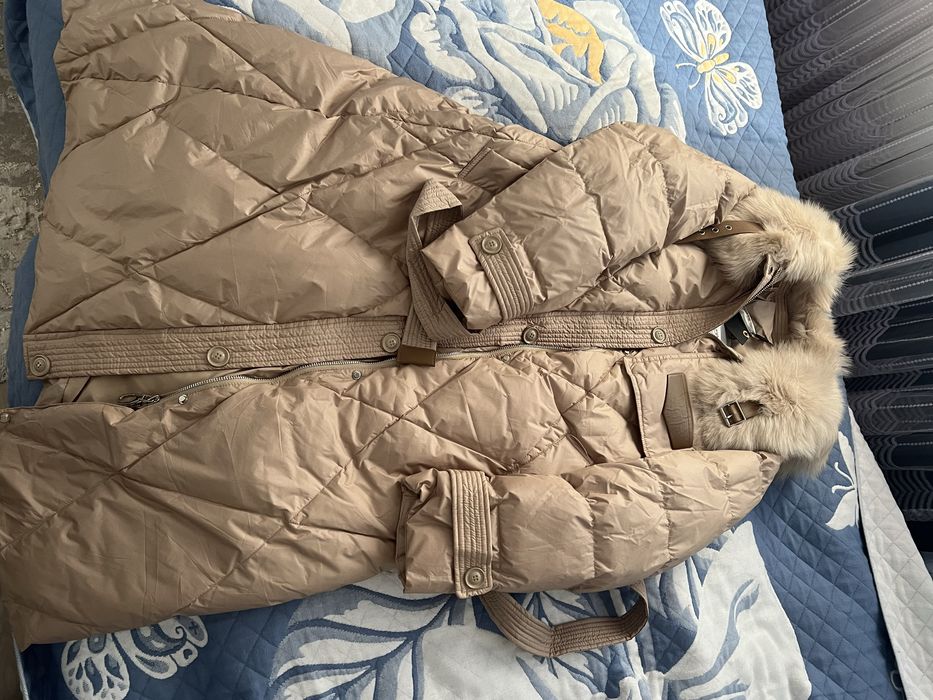 Продам новый пуховик