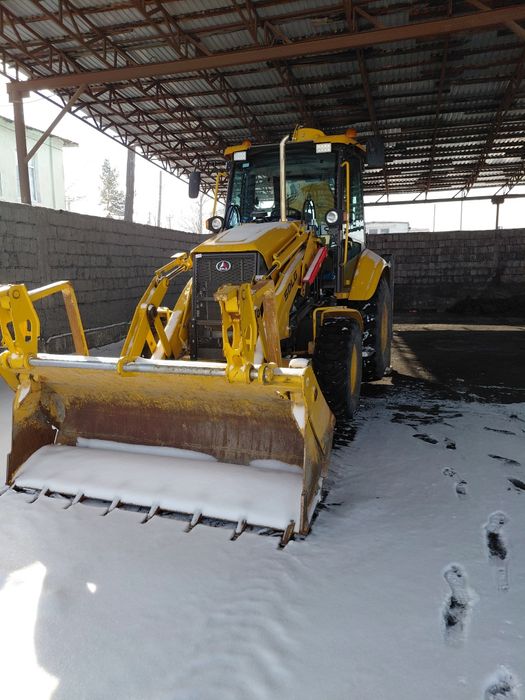 Эсковатор погрузчик